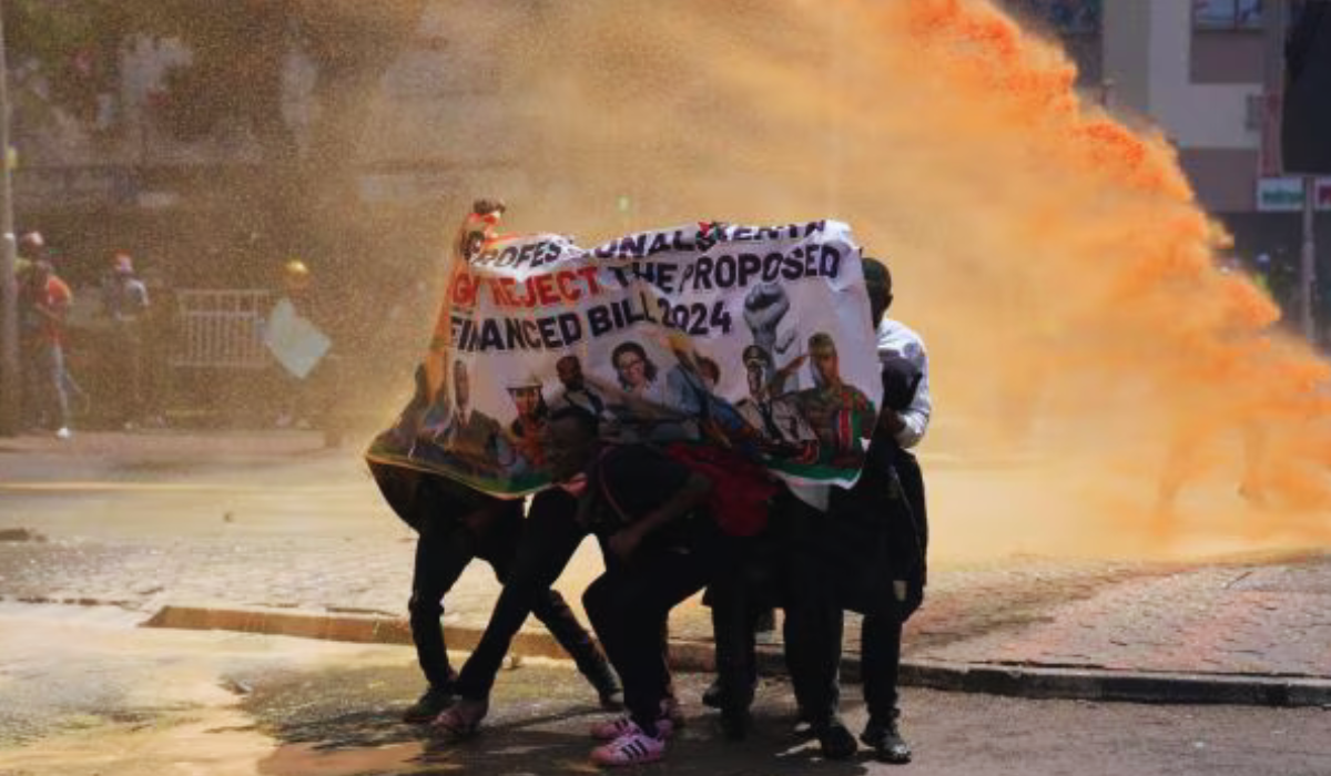 The protestors with banners against the Finance Bill